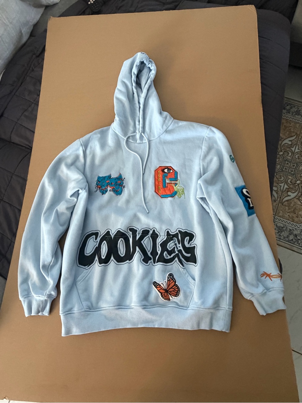 Cookies Light Blue Graphic Hoodie with Bold Logo
